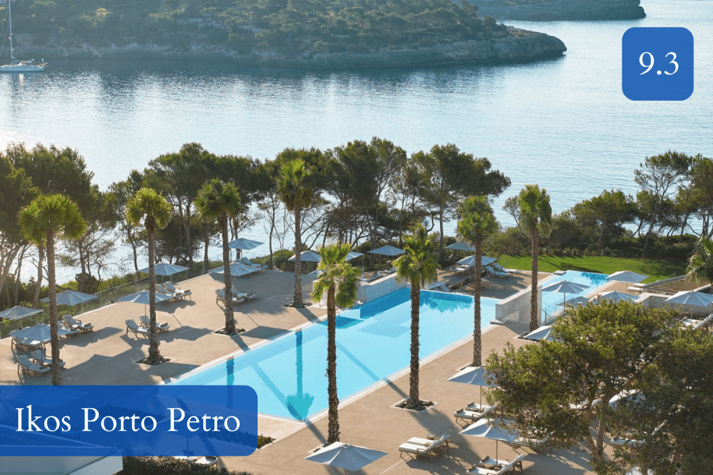 calm seafront pools and pine-fringed resort setting in Portopetro