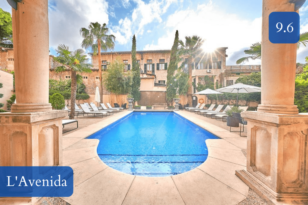 restored mansion facade and pool in the garden