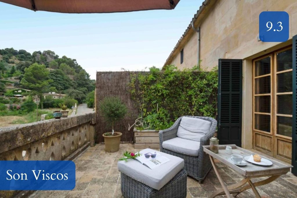 small farmhouse, old mills and garden views across Valldemossa valley