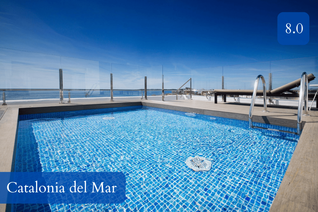 marina-side terrace and sea-facing pool