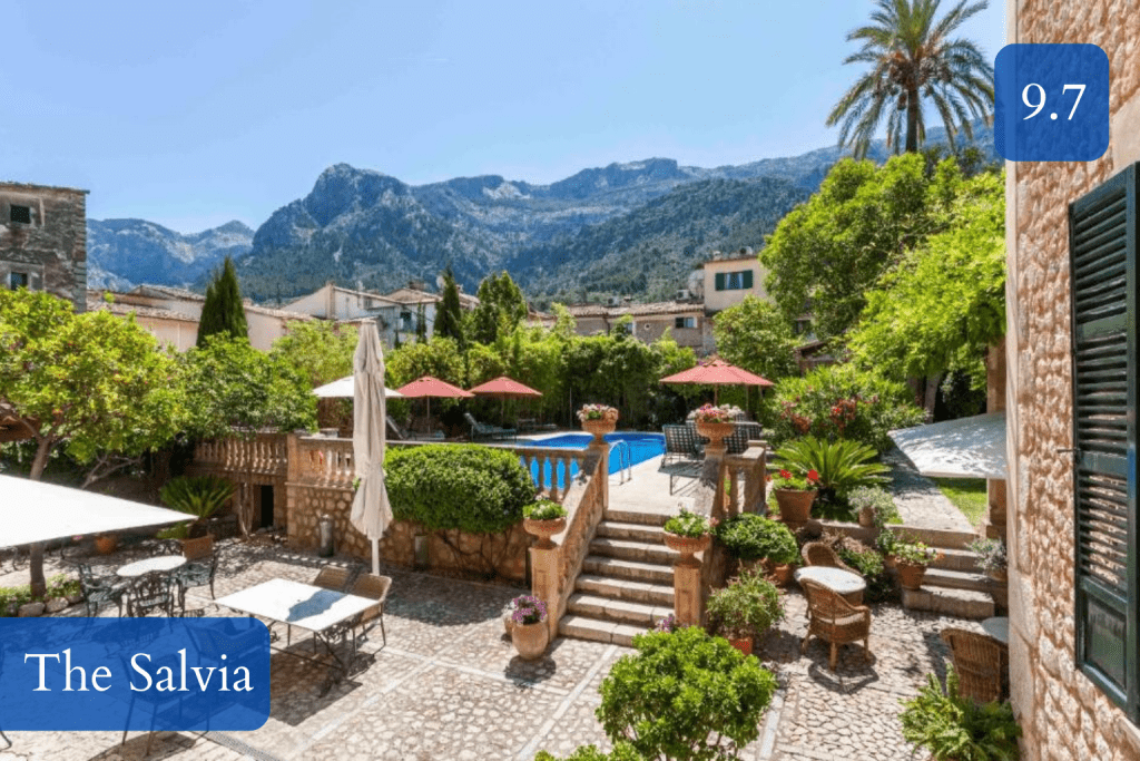 historic merchant house with gardens and mountain backdrop