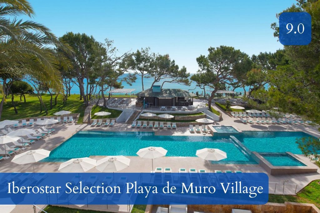 low-rise luxury resort with beachfront pools and gardens