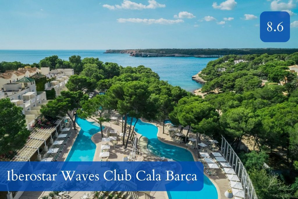 large resort complex beside small coves and pine trees