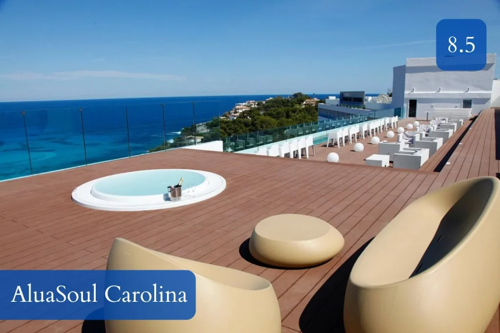 Rooftop terrace with jacuzzi and panoramic Mediterranean views at AluaSoul Carolina in Font de Sa Cala, Mallorca.