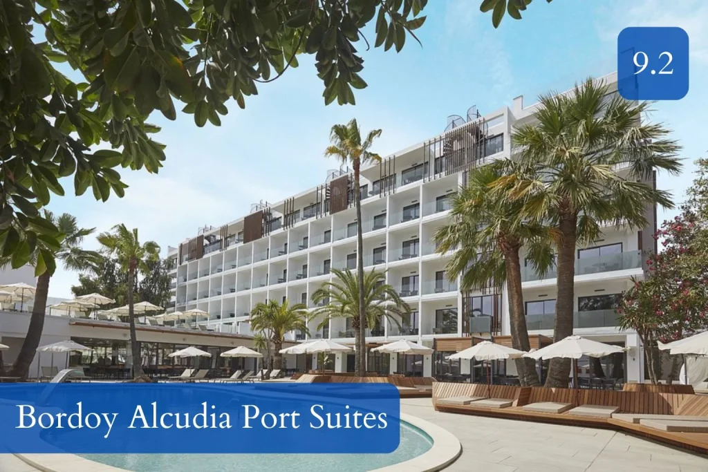 Outdoor swimming pool and sun terrace at Bordoy Alcudia Port Suites in Port d’Alcúdia, Mallorca.
