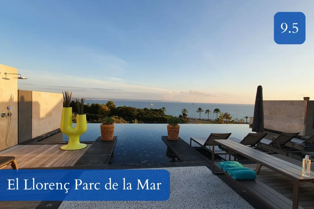 Rooftop infinity pool with sun loungers, modern terrace furnishings, and panoramic sea views at El Llorenç Parc de la Mar in La Calatrava, Palma de Mallorca