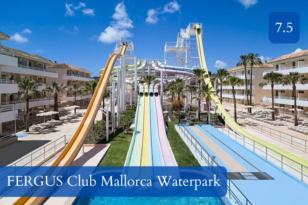 Large water slide complex with multi-lane racer slides at FERGUS Club Mallorca Waterpark in Magaluf, Mallorca