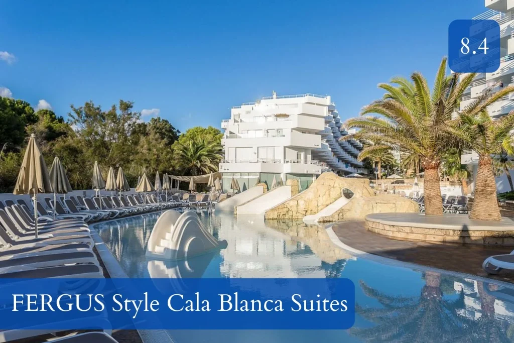 Pool with water slides and sun loungers at FERGUS Style Cala Blanca Suites in Santa Ponsa, Mallorca