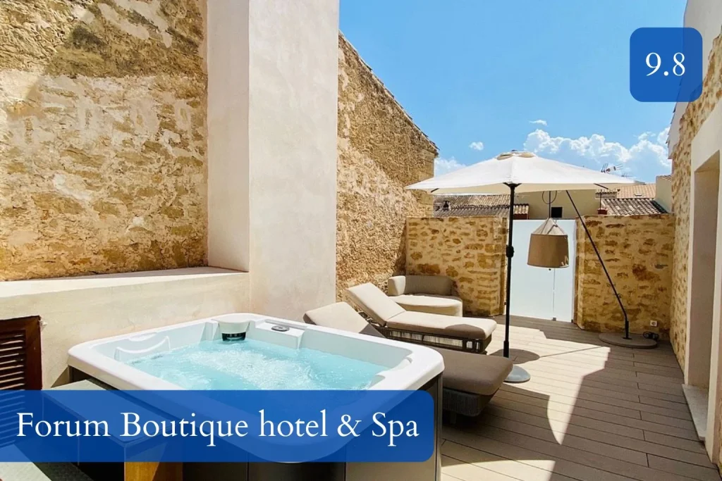Private terrace with jacuzzi and relaxation area at Forum Boutique Hotel & Spa in Alcúdia Old Town, Mallorca.