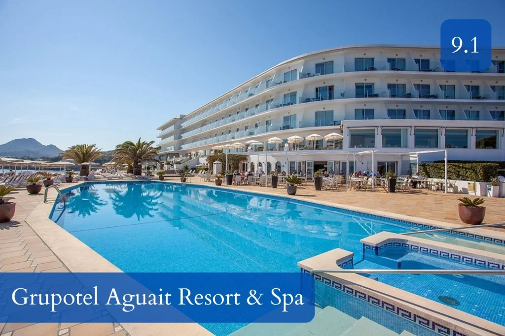 Outdoor swimming pool with Mediterranean Sea views at Grupotel Aguait Resort & Spa in Cala Ratjada, Mallorca.