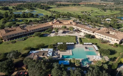 Aerial view of the pool area and golf course at Hacienda Son Antem Golf Resort in Llucmajor, Mallorca