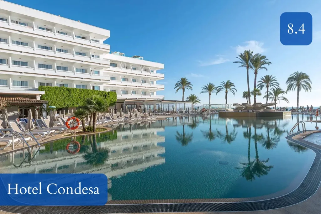 Outdoor pool area with Mediterranean views at Hotel Condesa in Playa de Alcúdia, Mallorca.