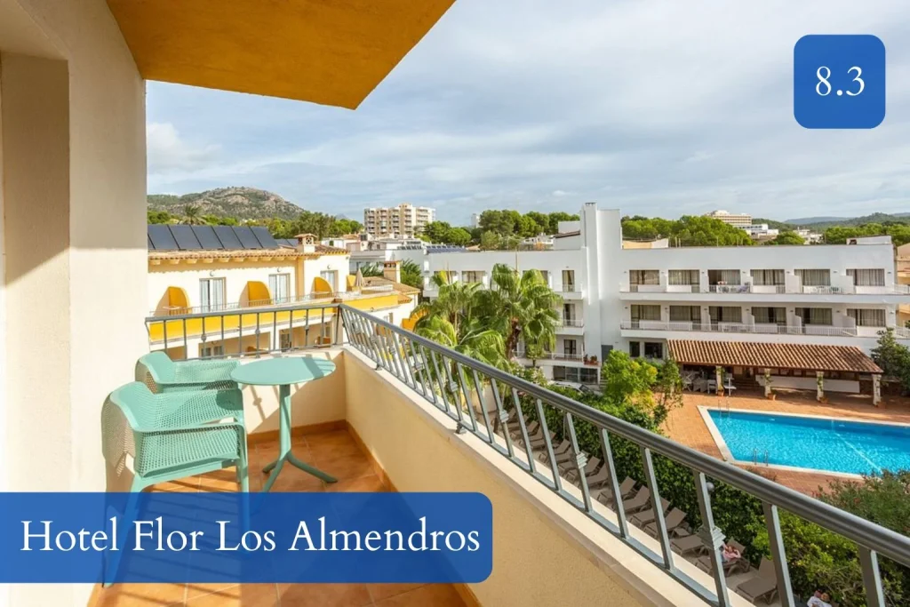 Balcony view overlooking the pool area at Hotel Flor Los Almendros in Paguera, Mallorca