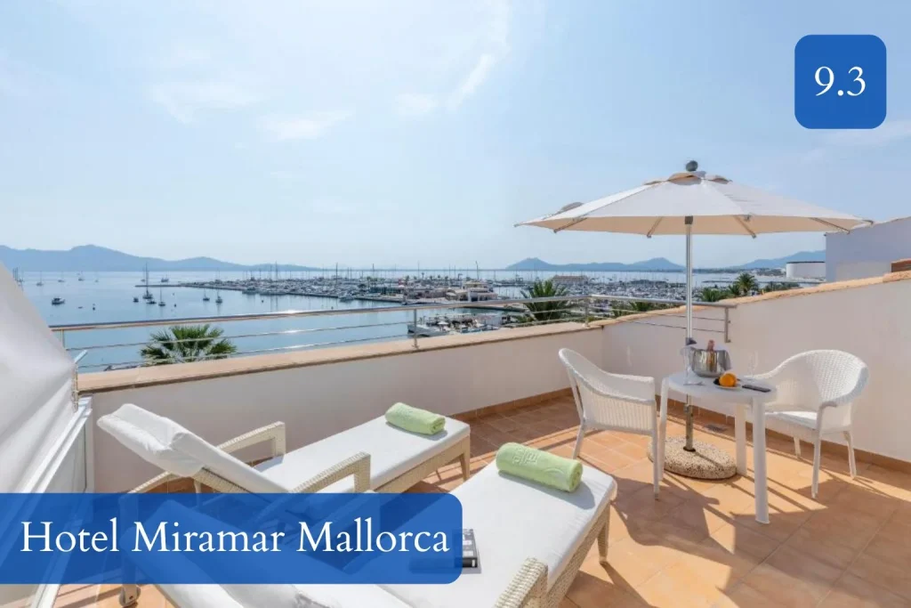Private terrace at Hotel Miramar Mallorca with marina, sea, and mountain views in Port de Pollença.