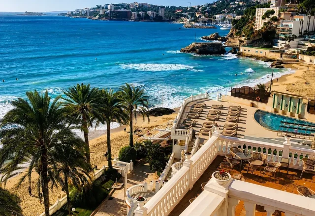Beachfront view from Hotel Nixe Palace overlooking the Mediterranean Sea and sandy beach in Palma de Mallorca