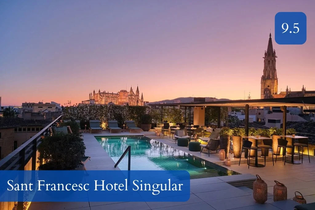 Rooftop pool and terrace at Sant Francesc Hotel Singular overlooking Palma Cathedral at sunset in Palma de Mallorca