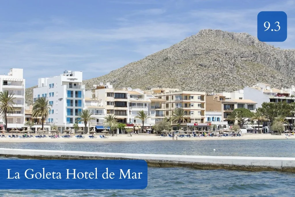 Beachfront setting of La Goleta Hotel de Mar in Port de Pollença, Mallorca, with bay and mountain views.