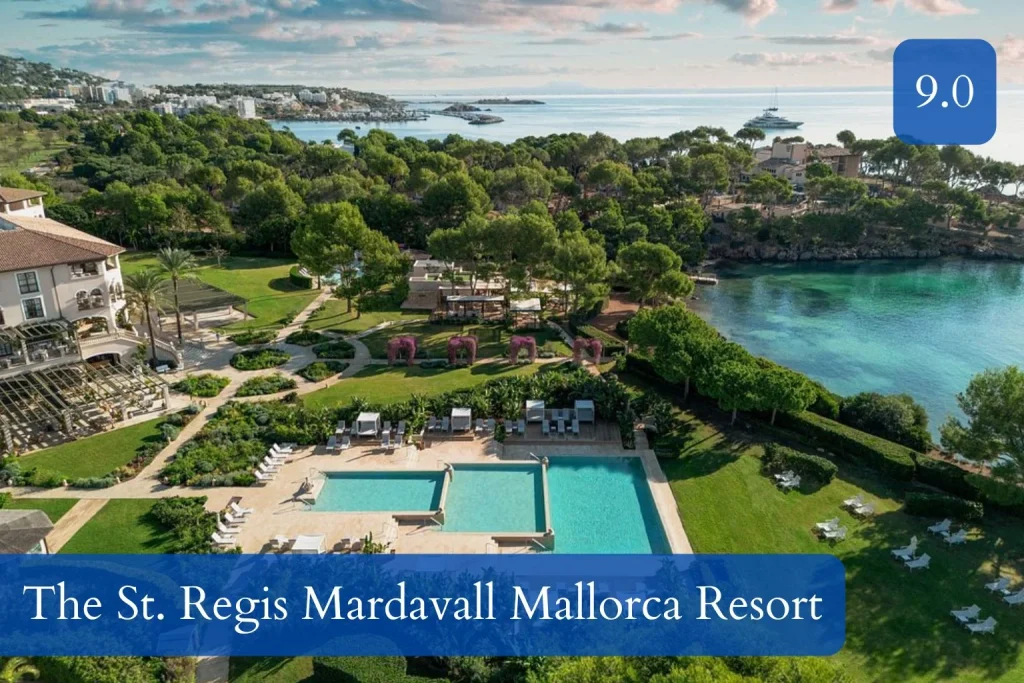 Aerial view of outdoor pools, landscaped gardens, and a turquoise bay at The St. Regis Mardavall Mallorca Resort in Costa d’en Blanes, Mallorca