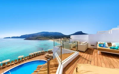 Sea-view terrace and swimming pool at VIVA Cala Mesquida Resort & Spa overlooking Cala Mesquida beach in Mallorca