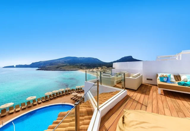 Sea-view terrace and swimming pool at VIVA Cala Mesquida Resort & Spa overlooking Cala Mesquida beach in Mallorca