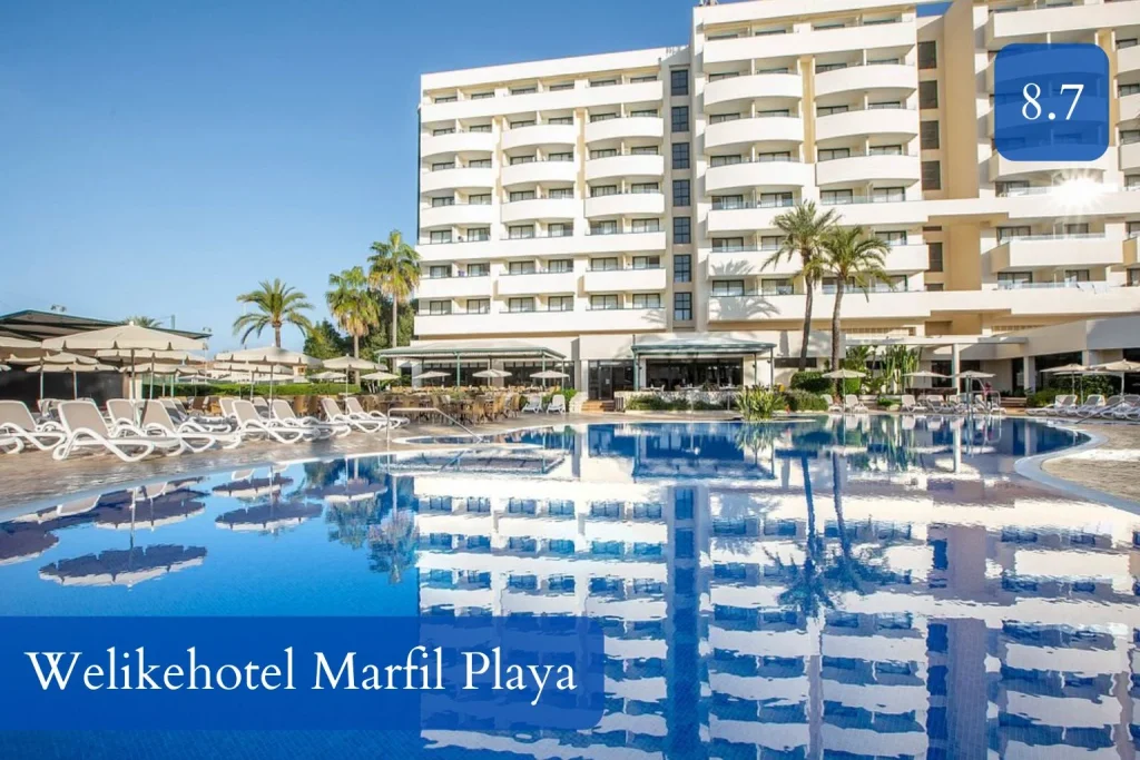 Outdoor pool area at Welikehotel Marfil Playa in central Sa Coma, Mallorca