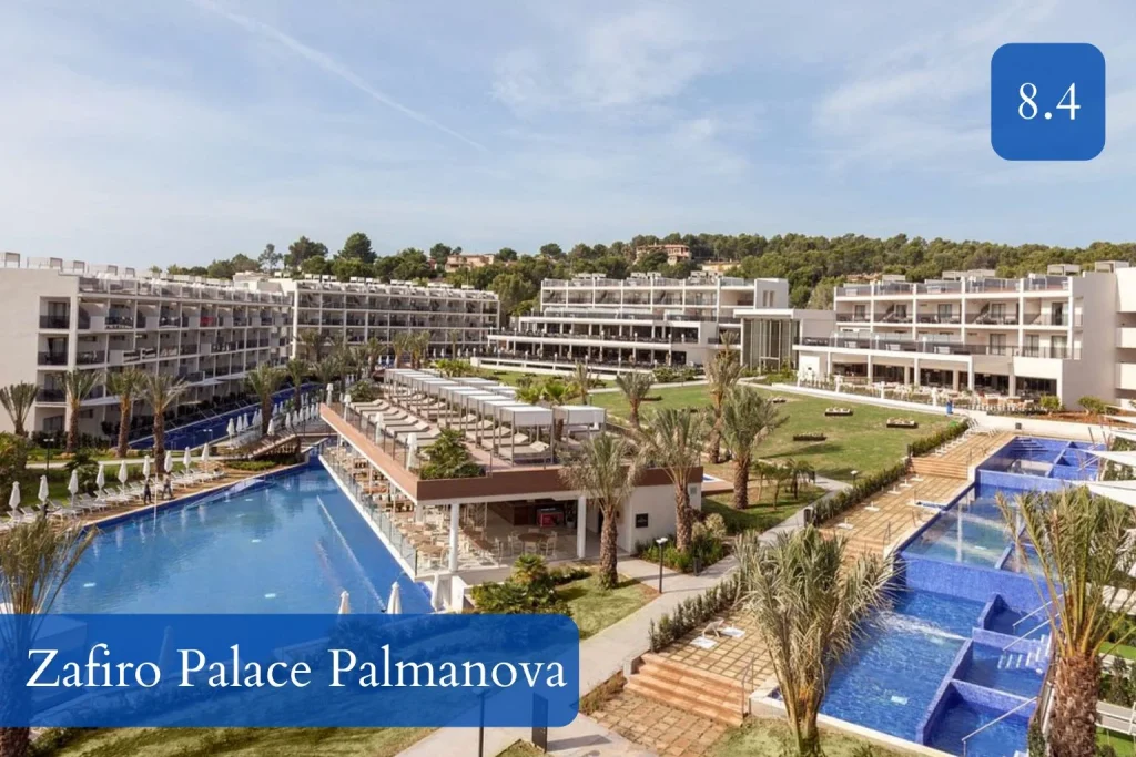 Luxury pool complex and landscaped resort grounds at Zafiro Palace Palmanova in Palmanova, Mallorca