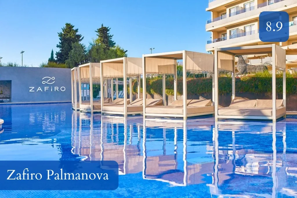Luxury outdoor swimming pool with Balinese beds at Zafiro Palmanova in Palmanova, Mallorca.