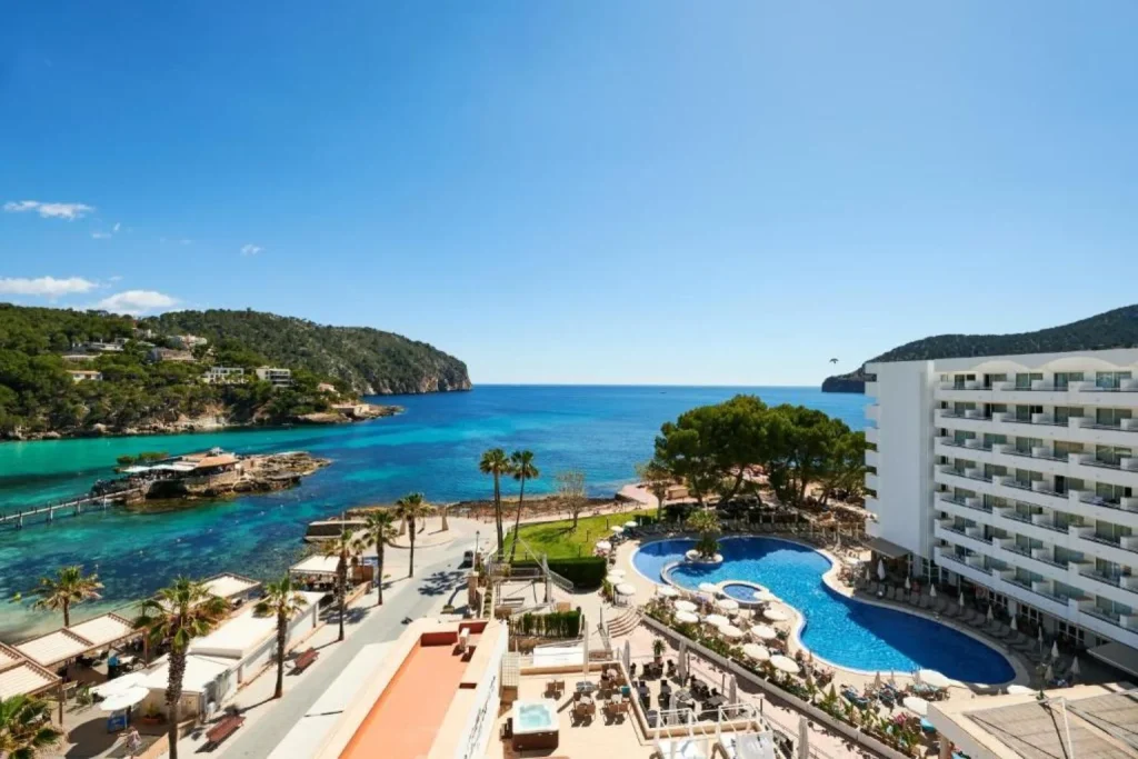 Seafront pool and bay view at Alua Gran Camp de Mar in Camp de Mar, Mallorca.