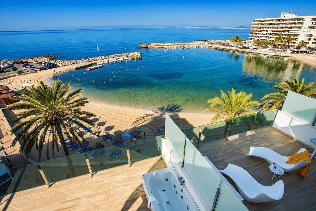 Sea-view suite terrace with a private hot tub at BQ Aguamarina Boutique Hotel in Can Pastilla, Majorca.