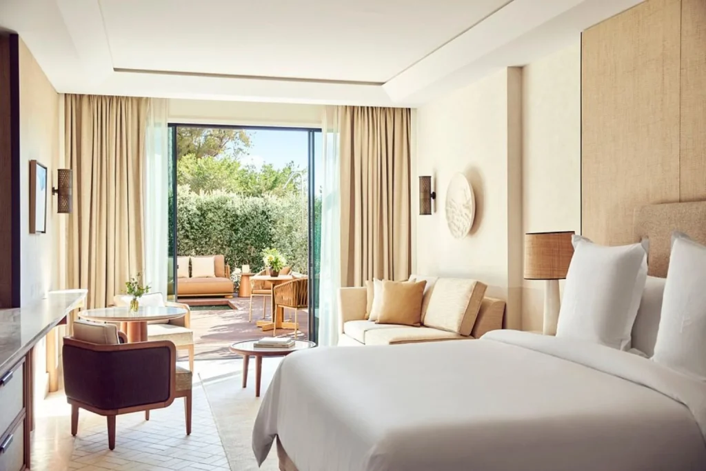 Elegant guest room with a private terrace at Four Seasons Mallorca at Formentor, Mallorca.