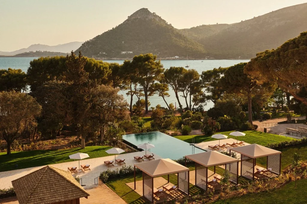 Infinity pool with private cabanas overlooking Formentor Bay and the surrounding mountains at Four Seasons Resort Mallorca at Formentor in Formentor, Mallorca