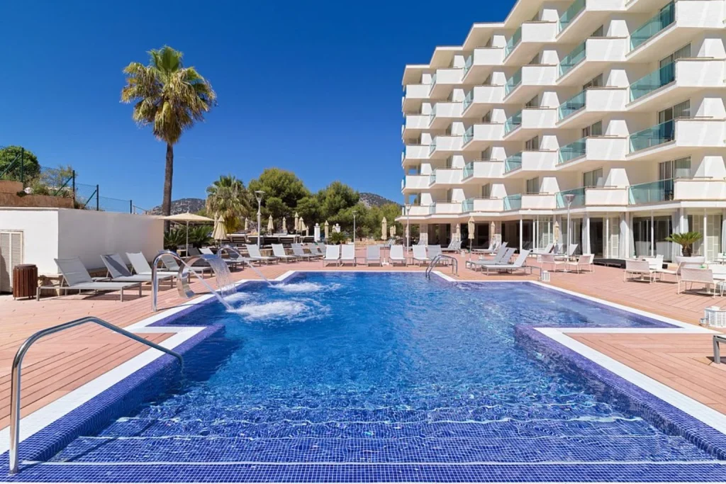Outdoor swimming pool with hydromassage features at H10 Blue Mar Boutique Hotel in Camp de Mar, Mallorca.