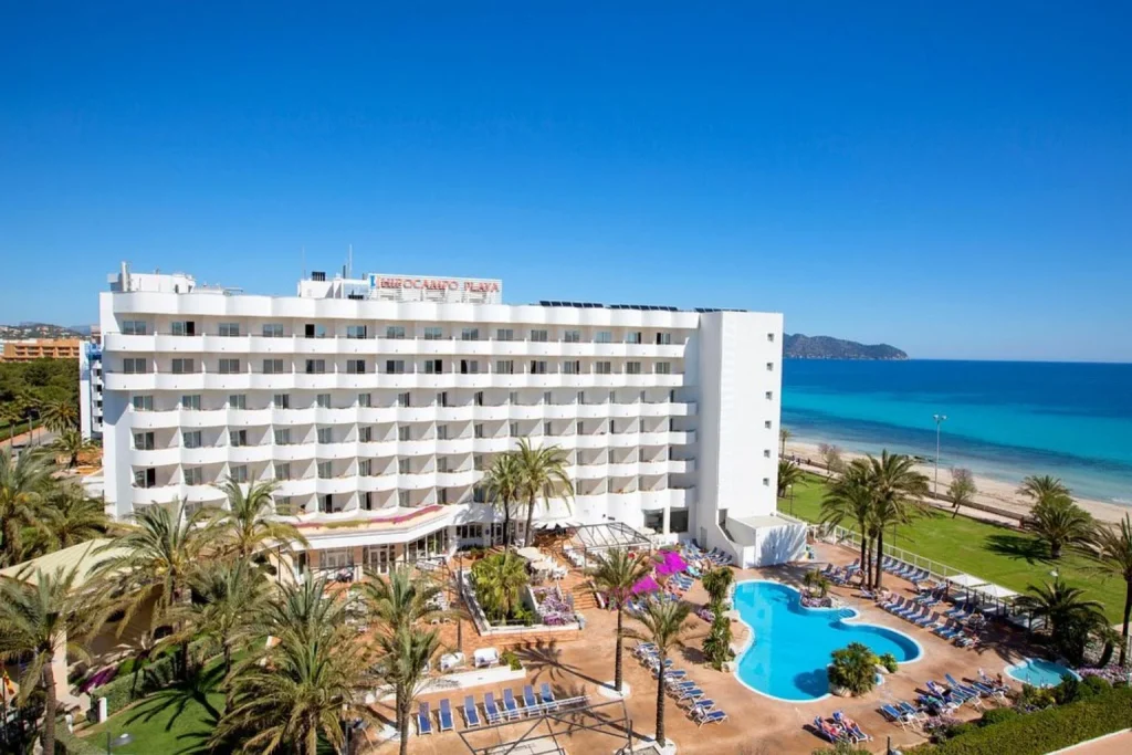 Beachfront view of Hipotels Hipocampo Playa overlooking Cala Millor Beach in Majorca.