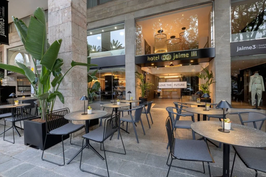 Hotel entrance and outdoor terrace at HM Jaime III in Palma, Mallorca.