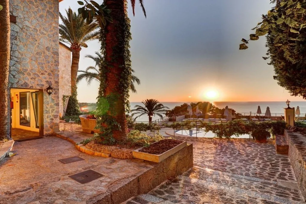 Sunset view overlooking the Mediterranean Sea from the grounds of Hoposa Costa D'Or – Adults Only in Deià, Mallorca.