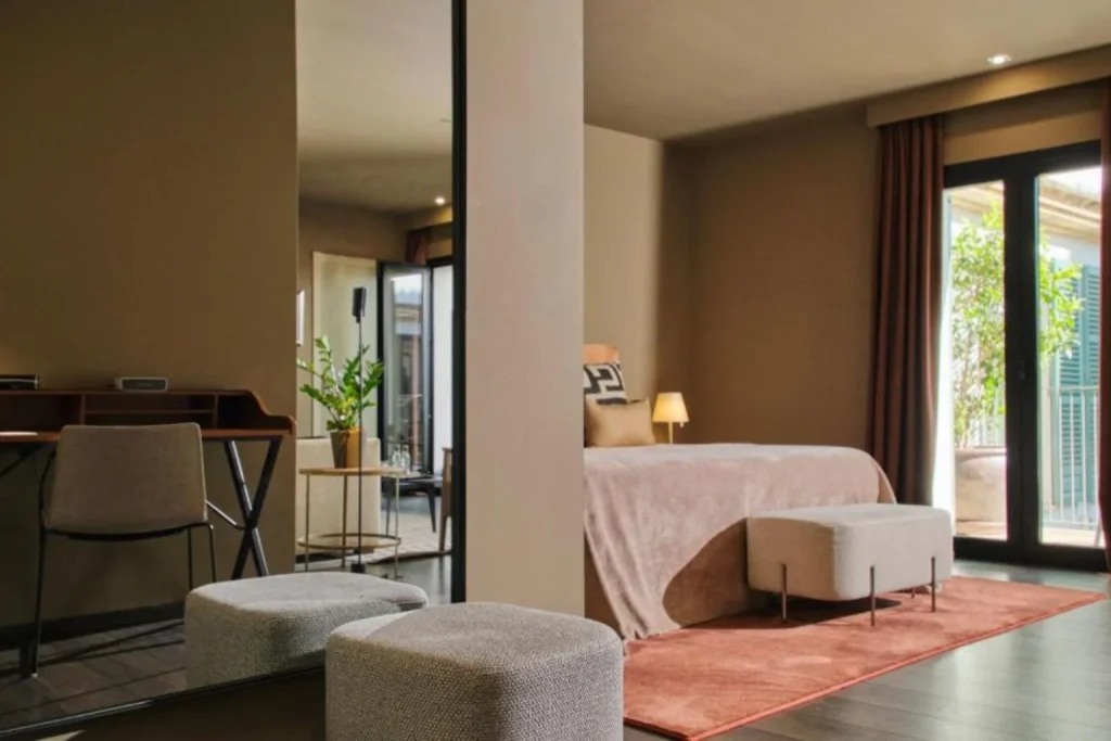 Elegant adults-only deluxe room with a private balcony at Hotel Can Alomar in Palma, Mallorca.