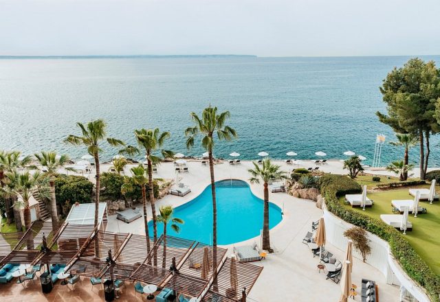 Oceanfront swimming pool overlooking the Mediterranean at Hotel de Mar Gran Meliá in Illetes, Majorca.