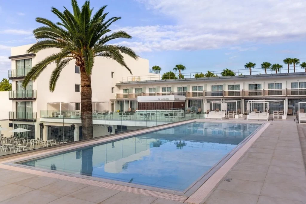 Main pool overlooking the hotel building and sun terrace at Hotel Samos in Playa de Palma.