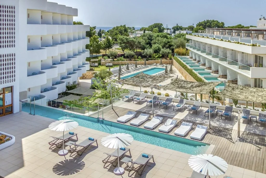 Hotel and pool view at Inturotel Cala Esmeralda Beach Hotel & Spa in Cala d'Or, Mallorca
