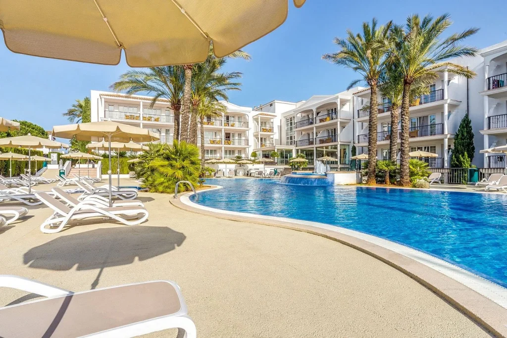 Main pool and hotel building at Inturotel Sa Marina in Cala d'Or, Mallorca.