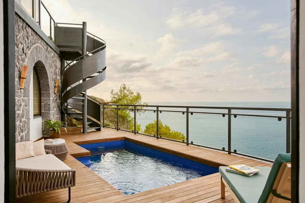 Private terrace with a plunge pool overlooking the Mediterranean at Jumeirah Port Soller Hotel & Spa in Port de Sóller.