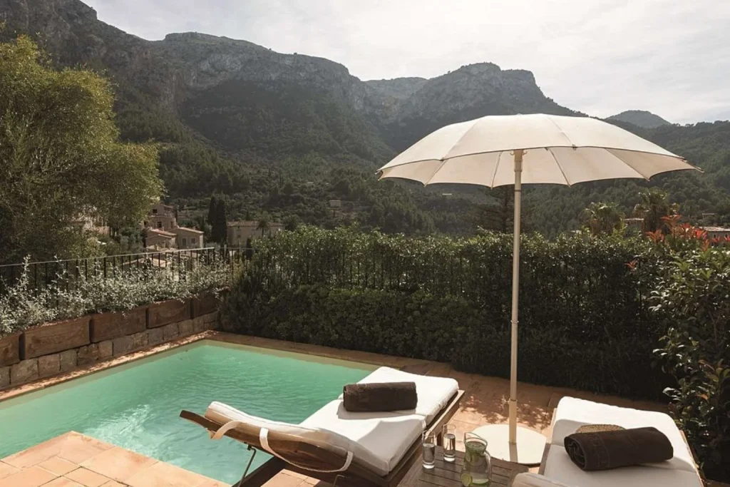 Private plunge pool with sun loungers and Tramuntana mountain views at La Residencia, A Belmond Hotel in Deià.