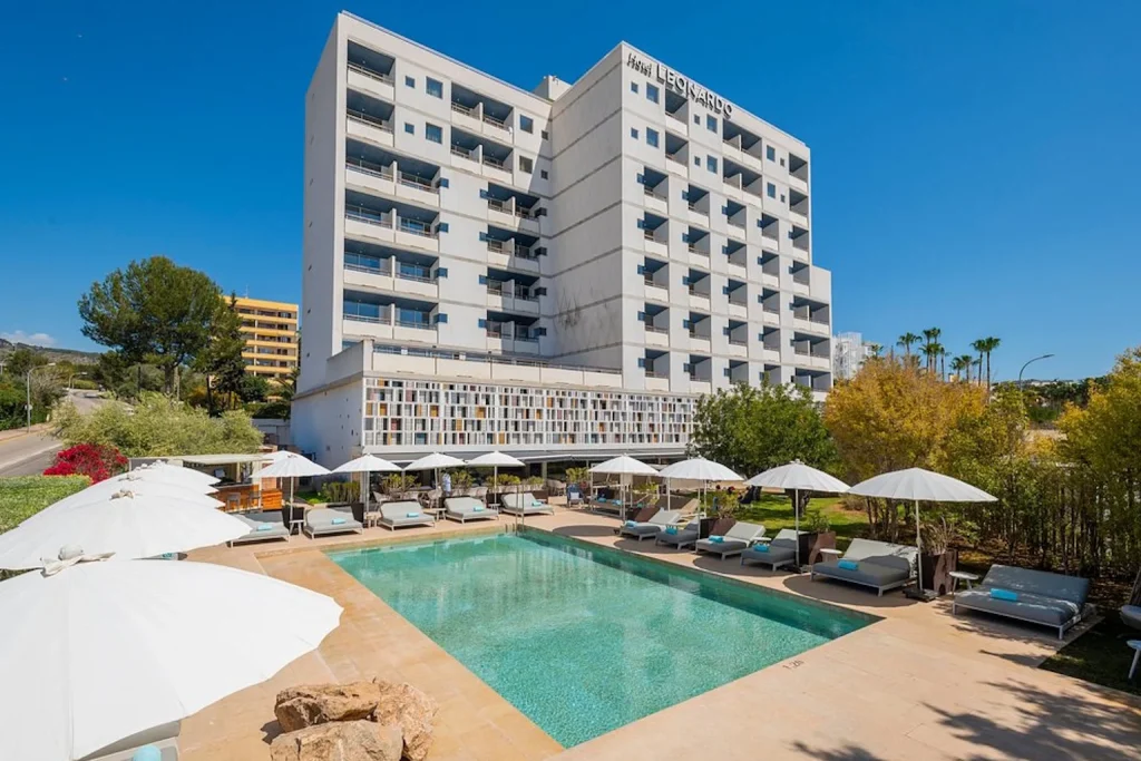 Outdoor pool area with sun loungers at Leonardo Boutique Hotel Mallorca Port Portals in Portals Nous, Mallorca.