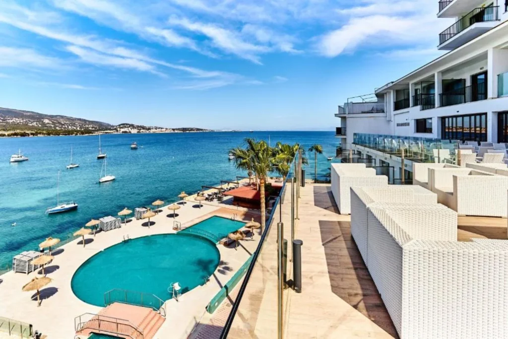 Seafront pool overlooking the bay at Leonardo Royal Hotel Mallorca in Palma.