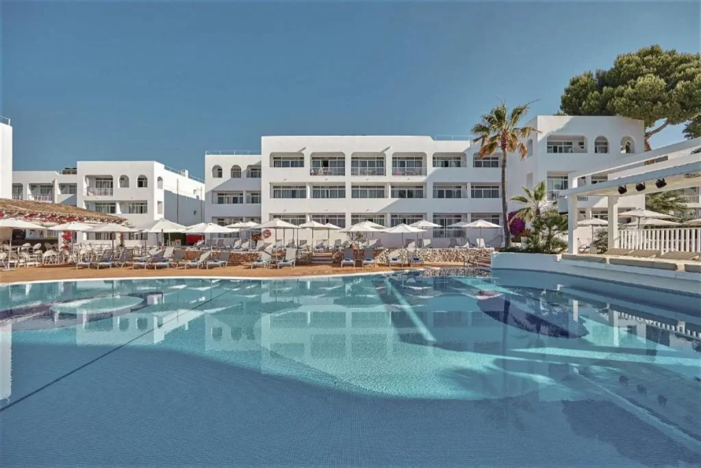 Main outdoor swimming pool with sun loungers at Prinsotel Alba & Spa in Cala d'Or, Mallorca.