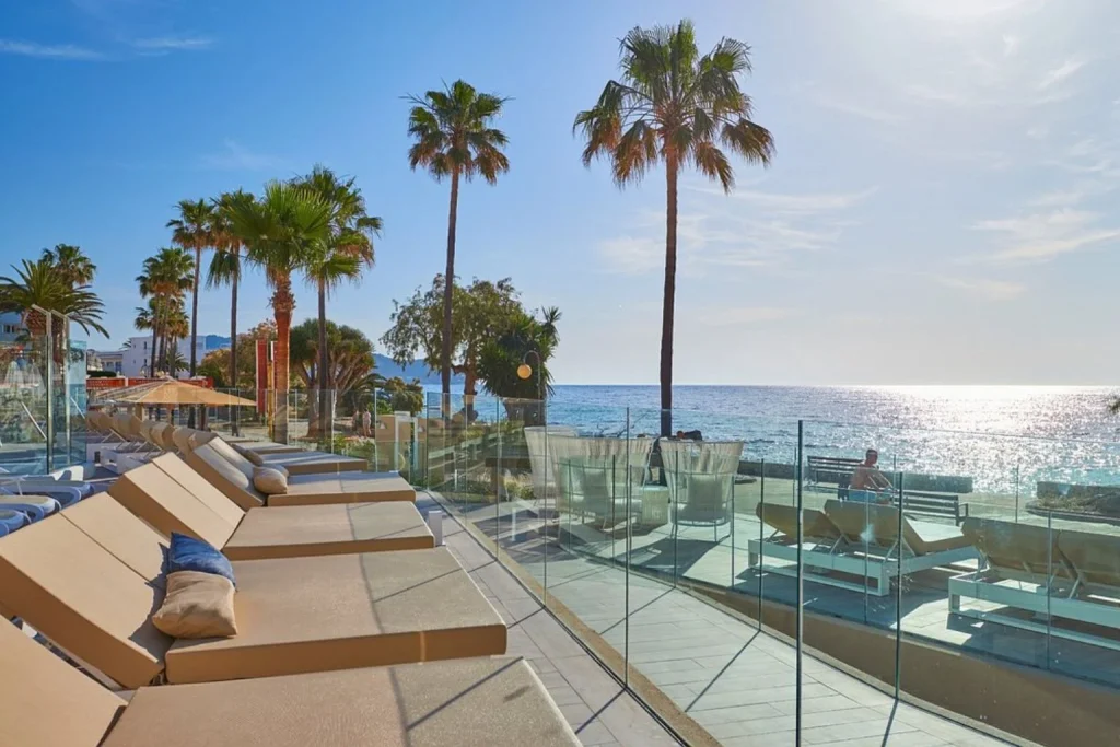 Oceanfront sun terrace overlooking the Mediterranean at Protur Bonamar Hotel in Cala Bona, Majorca.