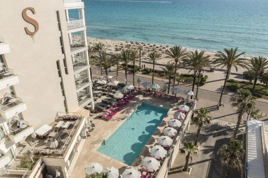 Oceanfront outdoor swimming pool overlooking Playa de Palma Beach at Pure Salt Garonda in Playa de Palma, Mallorca.
