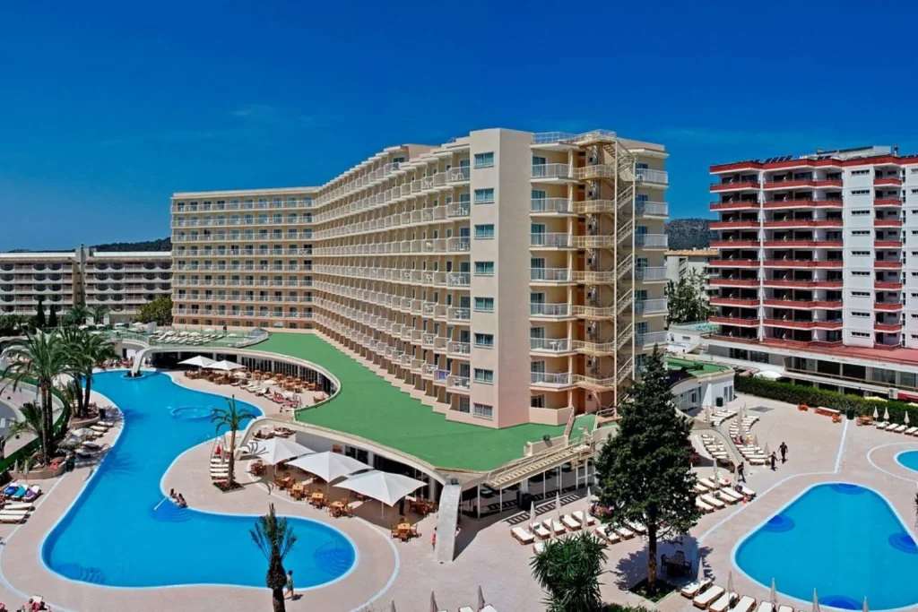 Aerial view of the outdoor swimming pools and hotel building at Sol Guadalupe in Magaluf, Mallorca.