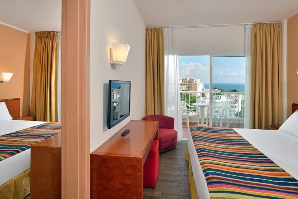 Connecting family room with a private sea view balcony at Sol Katmandú Park & Resort in Magaluf, Mallorca.