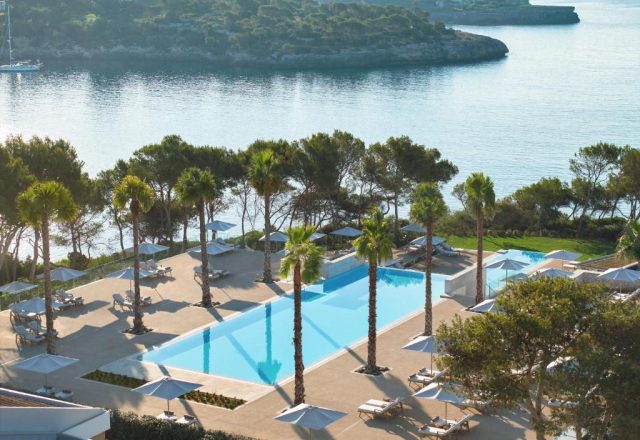 swimming pool sea view Ikos Porto Petro hotel Mallorca